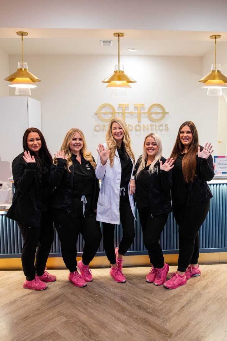 Otto Orthodontics team waving